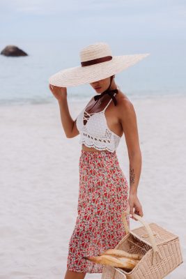 romantic-woman-beach-skirt-knitted-top-straw-hat-holding-basket-with-bread-eco-life (1)